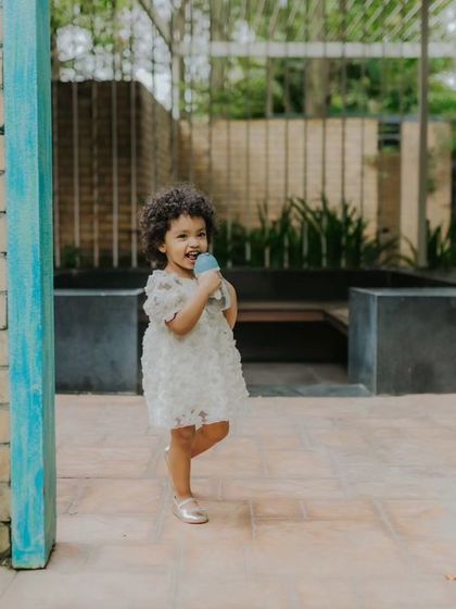 Another view of this little girl enjoying her summer day outdoors.