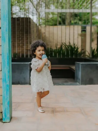 Another view of this little girl enjoying her summer day outdoors.