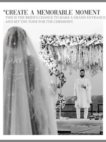A black and white shot capturing the bride's grand entrance from her perspective, as she looks towards her waiting groom.