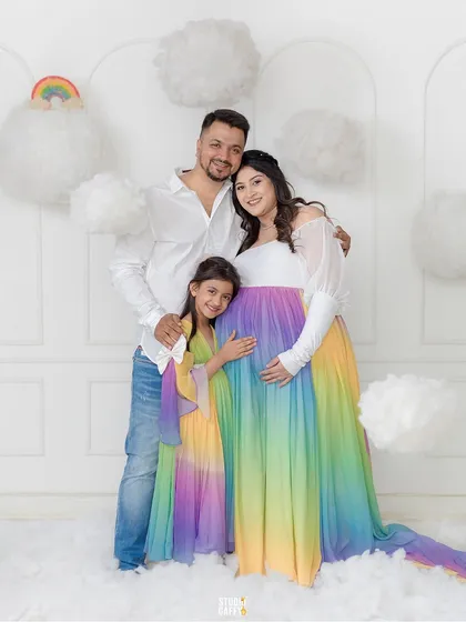 This is what it looks like when a mother's dream comes to life. We built this magical rainbow-themed set from scratch to celebrate their rainbow baby on the way, creating a vibrant, loving world as special as the family in it.