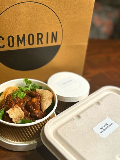 The bold flavors of our Goan Prawn Balchao, sealed and ready for your table. We pack the Poi bread separately to keep it soft and fresh for dipping into the spicy, tangy curry.