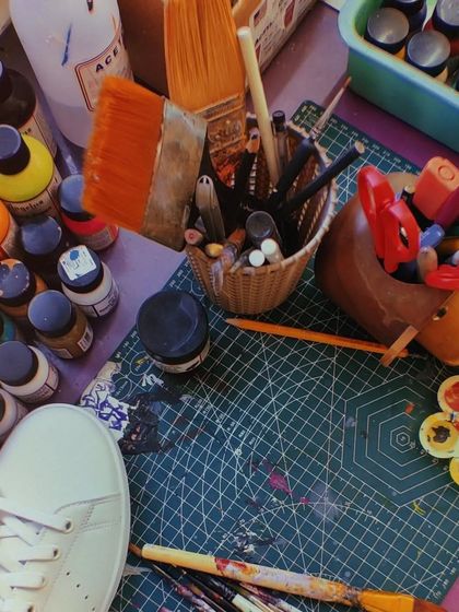 Welcome to my aesthetic mess. My workstation is always a chaotic mix of paints, brushes, and works in progress.