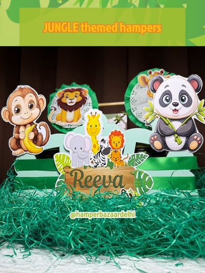 A close-up of the jungle theme hamper, showcasing the cute panda and monkey characters.