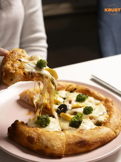 It's all about that perfect cheese pull. Our sourdough pizzas are made with the freshest ingredients for a truly satisfying, cheesy experience you won't forget.