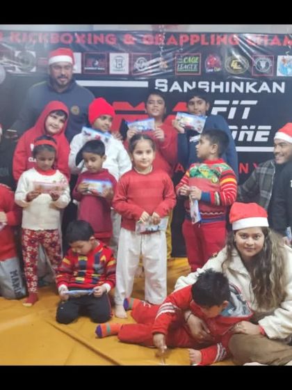 The whole gang in their Santa hats. These celebrations create happy memories and reinforce our sense of community.