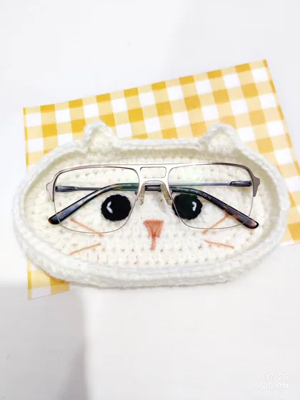 A cute and practical solution for keeping your glasses safe. This handmade cat-faced eyeglasses holder is also a perfect trinket tray for your desk, keeping your small essentials organized in the most adorable way.