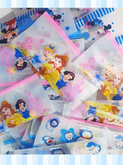 A pile of the themed stationery pouches, showing the variety of characters available.