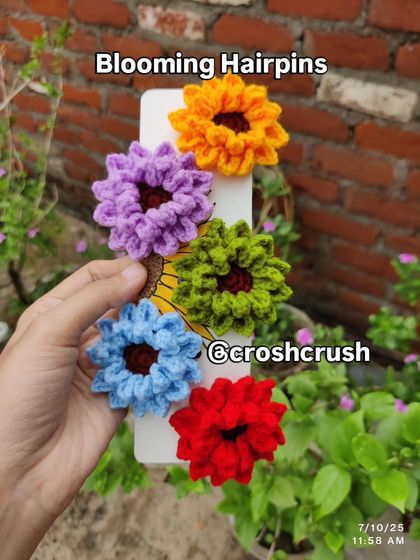 My blooming flower hairpins, available in green, purple, blue, red, and yellow. They are perfect for a sun-kissed, floral look.