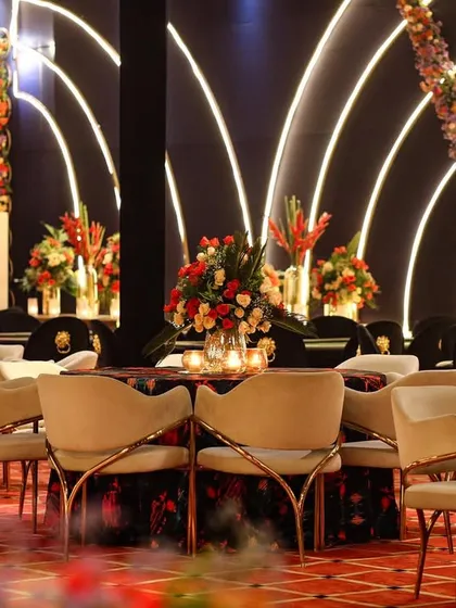 Another view of the seating arrangement, showing how the modern chairs and tables were placed in front of the glowing arch backdrop.