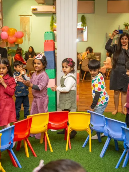 The intensity of musical chairs is real! I love organizing classic party games that get everyone involved, from the tiniest toddlers to the grown-ups cheering them on.