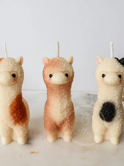 Meet my most adorable creation, the Alpaca candle! Each one is hand-poured from soy wax and detailed to capture its cute, fluffy texture. They are the perfect little companions to bring a smile to your face.