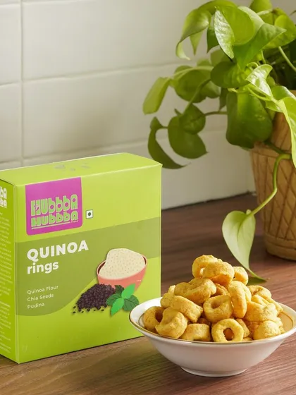 A clean, kitchen-counter shot of quinoa rings, using natural light to create a fresh and healthy feel.
