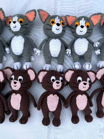 The details matter. This is a set of Tom and Jerry crochet dolls from a custom bulk order, showing the consistent quality and character accuracy I maintain across every piece.