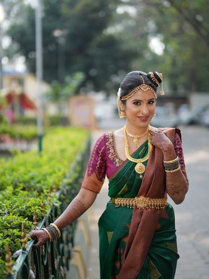 A full view of the traditional Iyengar bridal look. I am experienced in professional saree draping, including the nine-yard Madisar style, ensuring an authentic and elegant result.