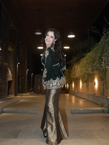 A lovely profile shot of Rupali Jagga, showing off her complete look, including our statement ring.