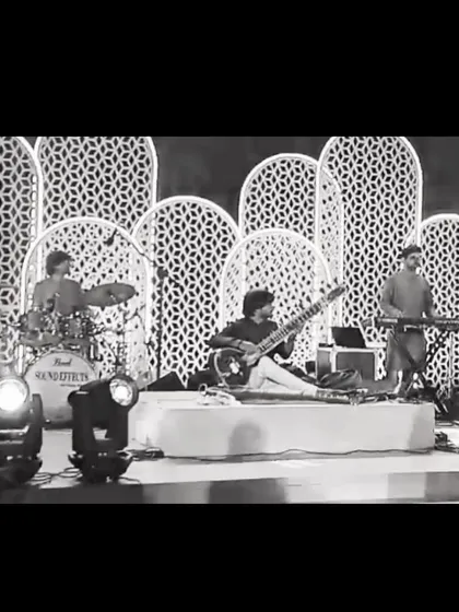 A black and white shot of my band performing at the Westin, Pune. The setup includes sitar, drums, and keys, creating a modern instrumental sound for a sophisticated audience.