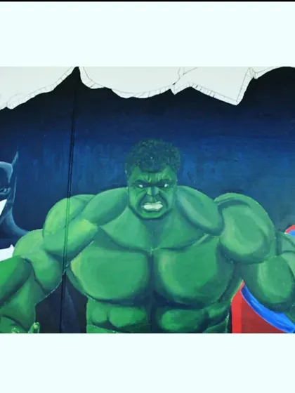 For the little heroes at home. I create epic superhero murals that make any kid's room the coolest space in the house. Here, Batman, the Hulk, and Superman burst through the wall, bringing action and imagination to life with bold colors and detailed painting.