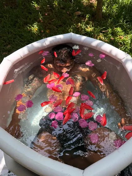 The ice bath is a powerful practice of surrender and resilience. It challenges the mind to find stillness amidst intensity, leaving you feeling incredibly alive, clear, and re-energized. The flower petals are a reminder of the beauty in the process.