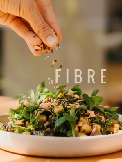 Every dish is an opportunity to add more fibre to your diet. Here, we're sprinkling a mix of seeds onto a fresh salad for an extra boost of nutrients and crunch.