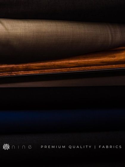 A look at our shelves, stocked with rolls of premium quality fabrics. This is where every bespoke journey begins, with the selection of the perfect material.