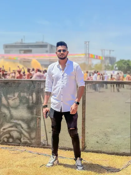 A posed shot during a Holi festival. Even in the middle of the colorful chaos, we take a moment to capture the vibe.