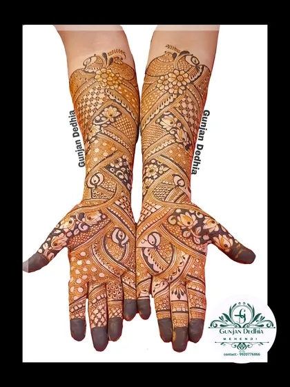 A traditional full-hand design with a beautiful flow. The pattern combines peacock, floral, and geometric elements for a rich and intricate look.
