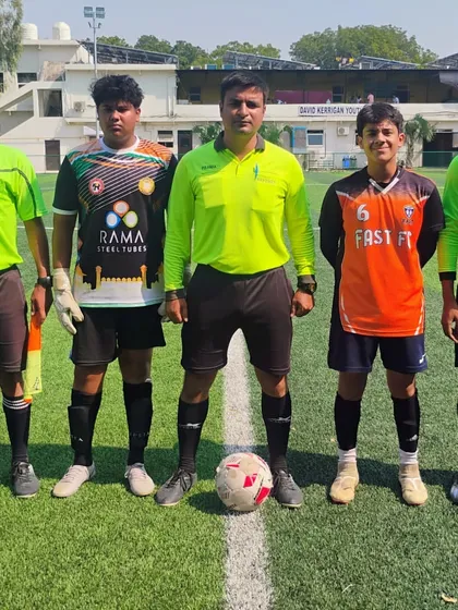 The pre-match formalities with captains and officials for our U15 league game.
