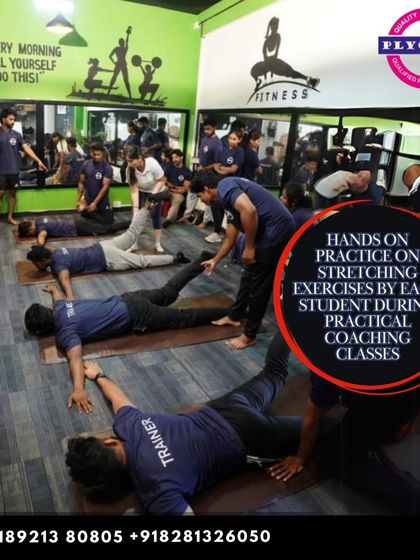 Flexibility and mobility are just as important as strength. Here, our students are engaged in a hands-on practical coaching class, learning and practicing various stretching exercises to improve range of motion and prevent injuries.