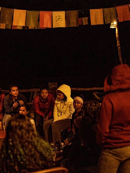 A duplicate of 151, this image of our group around the campfire highlights the warmth and connection that defines our festival nights.