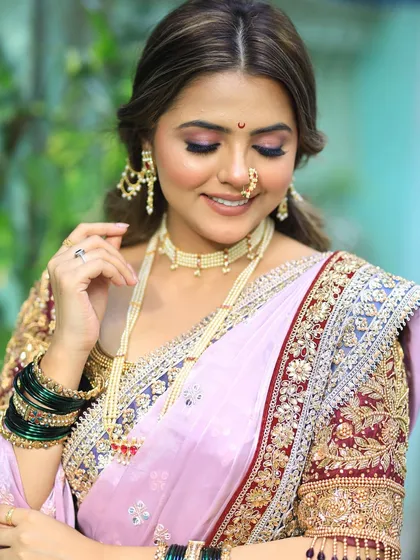 A beautiful shot capturing the soft plum eyeshadow and the overall elegance of the look.