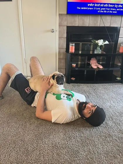 The best reward. Buddy the pug, relaxing with his dad in the USA. We were part of Buddy's journey, from helping with his weight loss to managing his relocation, and seeing him happy and settled with his family is everything.