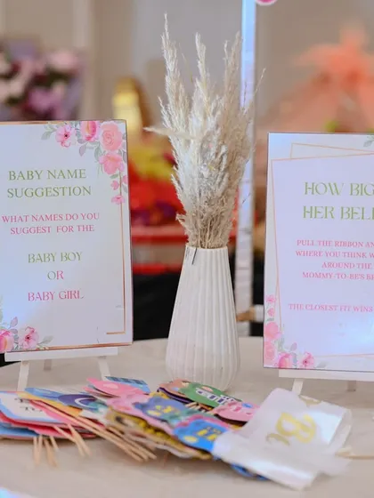 Fun game ideas for a baby shower, including 'Baby Name Suggestions' and 'How Big is Her Belly?', complete with props for photos.