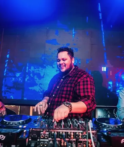 Having fun while doing the job is mandatory. A candid shot of me smiling while working the mixer.