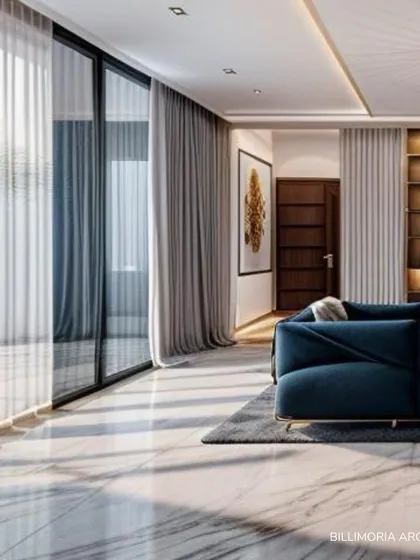 Sunlight streams into this living area through sheer curtains, highlighting the polished marble floors and creating a bright, welcoming atmosphere. The layout is intentionally open, connecting the seating area to other parts of the home for a fluid living experience.