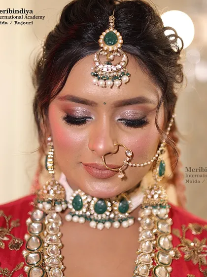 This pose is perfect for showcasing the intricate eyeshadow blending. You'll learn to create smooth gradients and impactful color combinations.