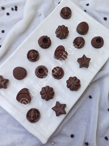 An elegant display of my homemade chocolates. From stars to hearts, there's a shape and flavour for every chocolate lover.