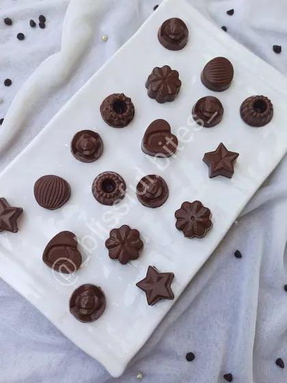 An elegant display of my homemade chocolates. From stars to hearts, there's a shape and flavour for every chocolate lover.