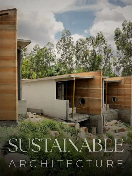 Our commitment to sustainable architecture is embodied in this structure. The use of rammed earth, a natural and locally sourced material, allows the building to merge seamlessly with its environment, reflecting the very soil it stands on.
