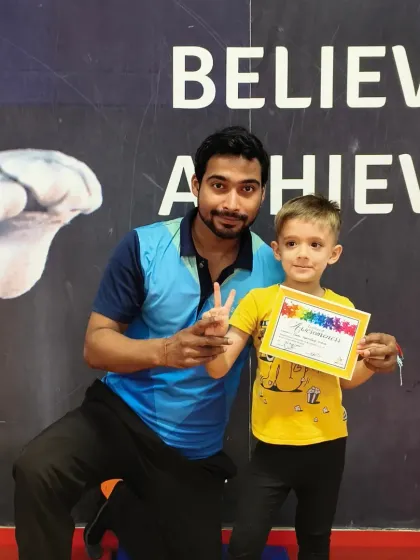 Another happy gymnast with his new certificate. These awards are a key part of how we track progress and keep our students excited about their fitness journey.