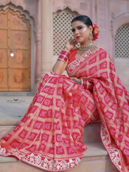 A close-up of the model seated on the steps, her expression serene and captivating.
