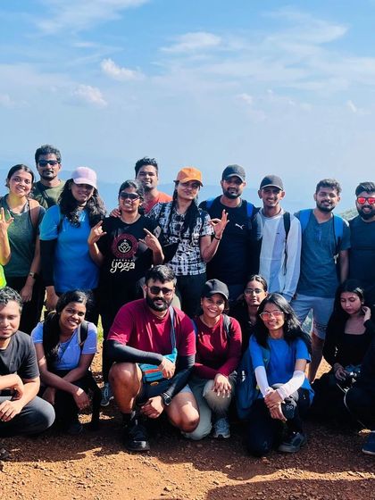 A sunny day on the trail. This group is enjoying the clear skies and beautiful views on their way to the summit.