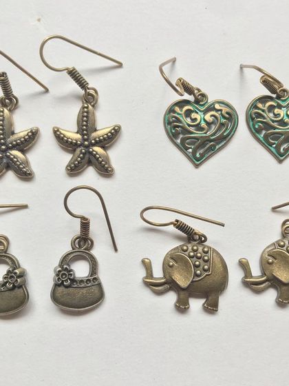 My collection of tiny, cute antique-finish earrings. Featuring designs like starfish, hearts, elephants, and little bags, these are lightweight and perfect for kids or for a subtle everyday look.