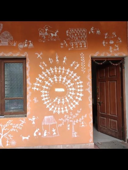 We also specialize in traditional Indian art forms like this Warli painting. This art style is perfect for adding a touch of ethnic heritage and storytelling to an entryway or feature wall in a home or commercial space.
