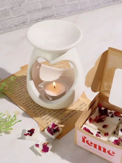 A few things I'm using regularly: our square melts with rose petals and a heart-shaped diffuser.