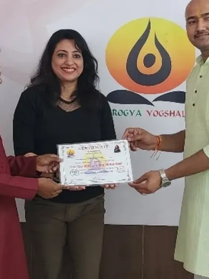A proud moment as a student receives her certification. Each graduate represents a new beginning and another step towards a healthier community.