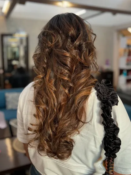 The final look of this caramel balayage, full of movement, shine, and beautiful, warm dimension. Perfect for any season.