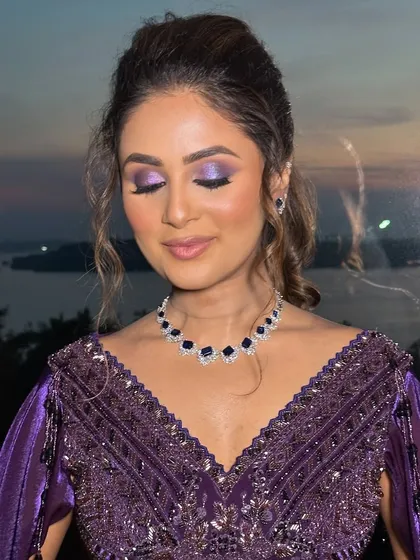 A view of the blended purple eyeshadow. This look is crafted to make heads turn with its sultry eyes and radiant glow.