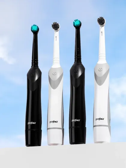 A sleek shot of electric water flossers against a sky background. This composition gives the products a modern, high-tech feel, emphasizing their advanced cleaning power.
