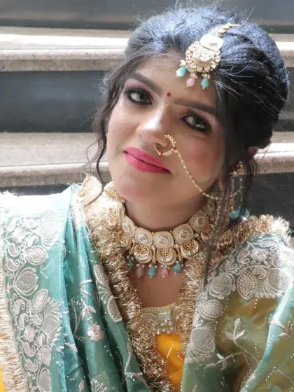 A bright and bold lip color is characteristic of many Punjabi bridal looks. We train students on color theory to choose the perfect shades.