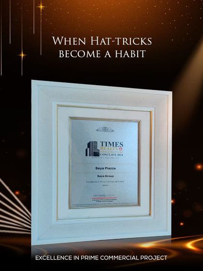 We are proud to have won three awards at the Times Realty & Infrastructure Conclave 2024. This image displays our award for Excellence in Prime Commercial Project for Saya Piazza.